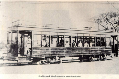 Double-truck Meralco streetcar with closed sides
